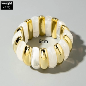 Detail view of acrylic tube bracelet showing 72.9g weight and 6cm diameter dimensions