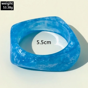 Detail view of translucent blue resin bangle weighing 53.38g with 5.5cm inner diameter