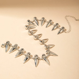 Punk style silver spike choker necklace with adjustable chain for a bold rock look