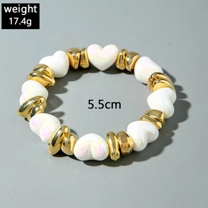 Detail of beaded heart bracelet with gold and pearl beads, 5.5cm diameter and 17.4g weight