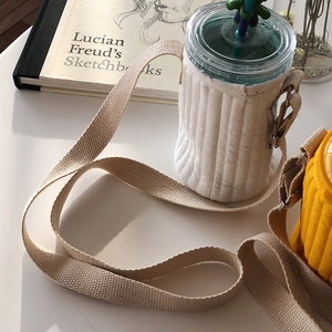 Close-up of quilted rib fabric water bottle carriers with adjustable shoulder straps