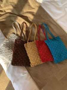 Handmade crochet mini tote bags in metallic yarn colors shown in five elegant shades