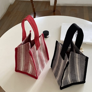 Minimalist striped canvas tote bags with wide handles for daily casual use