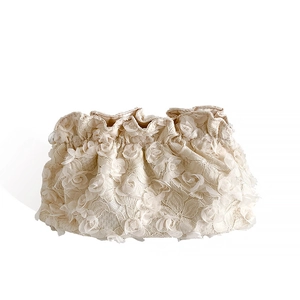 Elegant beige lace makeup bag featuring 3D floral appliques and a drawstring closure