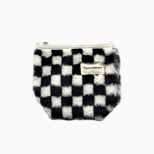 Plush checkered makeup bag with black and white grid pattern and zipper closure