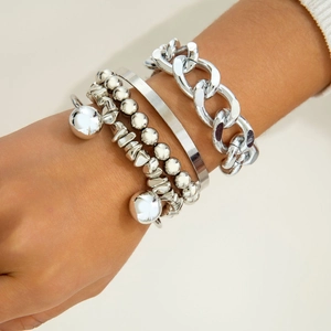 Silver multi-layer beaded bracelet set featuring thick chunky chain and metal bangles