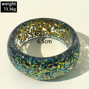 Detail showing resin bangle with colorful glitters, inner diameter 6.5cm, weight 73.36g