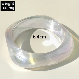 Macro shot of resin iridescent bangle showing 6.4cm inner diameter and 66.78g weight