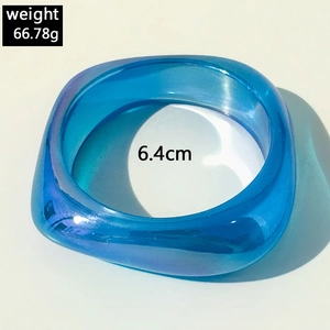 Blue resin bangle detail showing 6.4cm inner diameter and 66.78g weight specifications