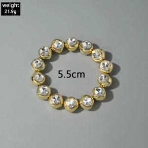 Detailed view of a gold square crystal stretch bracelet weighing 21.9g and 5.5cm wide