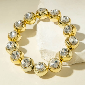 Elegant multi-layered golden bead bracelet with sparkling square-cut large diamonds
