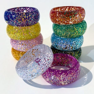 Colorful resin glitter bangles with aurora sequins and vibrant macaron colors