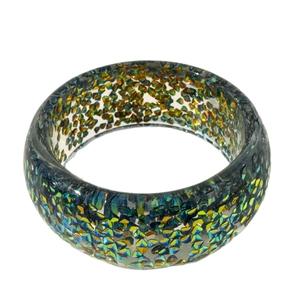 Colorful resin bangle with chunky glitter and reflective sequins in dopamine macaron style