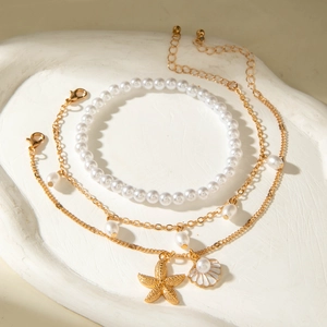 Set de 3 tobilleras bohemias con perlas, estrella de mar dorada y colgante de concha