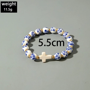 Detail of vintage flower ceramic bead bracelet with cross pendant, weight 11.5g and 5.5cm