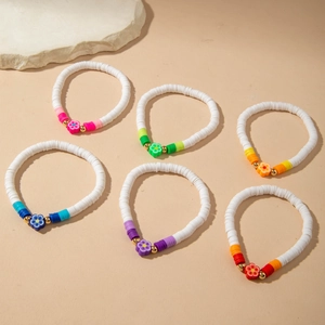 Set of 6 colorful Bohemian flower bracelets with white Heishi beads and gold accents