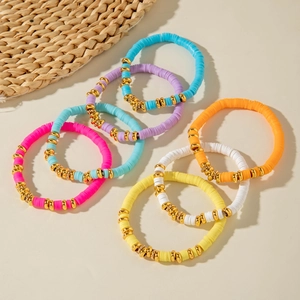 Colorful Bohemian handmade stretch Heishi bead bracelets with golden disk spacers set