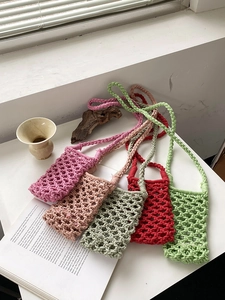 Handmade crochet mini crossbody phone bags in five vibrant colors with hollow mesh design