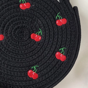 Handwoven black cotton rope bag with 3D red cherry embroidery for summer vacations