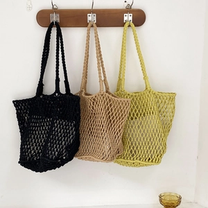 Handmade woven tote bags in black, khaki, and green colors with minimalist hollow mesh design
