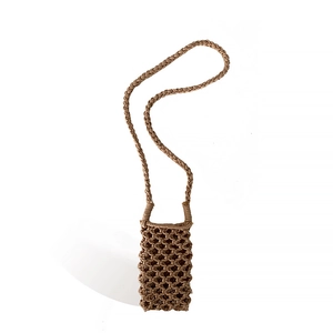 Handmade woven cotton rope crossbody phone bag with hollow mesh pattern in tan brown