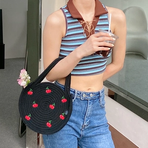 Handwoven black cotton rope bag with red cherry embroidery for summer vacations