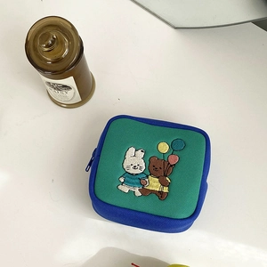 Mini storage pouch featuring cute bear embroidery and dual-tone canvas fabric detail
