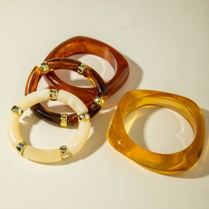 Retro resin bangle set with amber and tortoiseshell beads and golden metal spacers