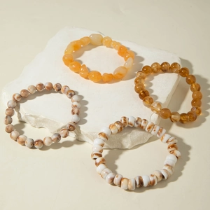 Bohemian multilayer acrylic beaded bracelets featuring retro amber and stone textures