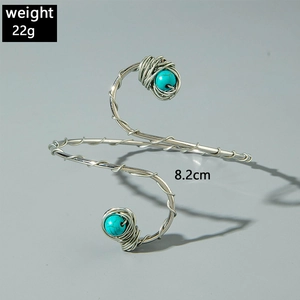 Bohemian silver coiled arm cuff with turquoise beads showing 8.2cm diameter and 22g weight