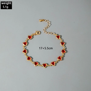Golden heart bracelet with red gemstone showing 5.1g weight and 17+5.5cm length detail