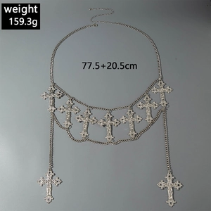 Detail of silver punk body chain featuring hollow cross pendants and measurement info