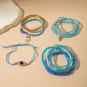 Bohemian blue beaded bracelet set with Evil Eye and Hamsa Hand charms for women