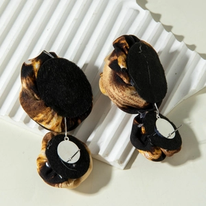 Retro leopard print fabric flower drop earrings showing back detail and silver posts