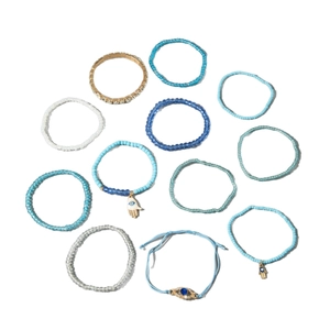 Bohemian 11-piece beaded bracelet set featuring Hamsa Hand and Evil Eye charms