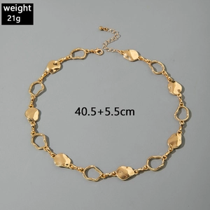 Detail view of gold punk chain necklace with weight 21g and size 40.5cm plus 5.5cm extension