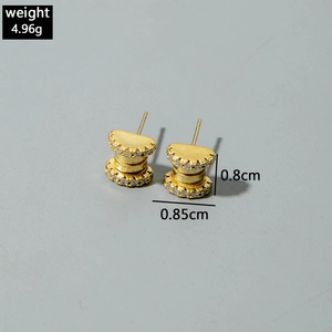 Detail view of gold layered cylinder stud earrings with zircon inlay and dimensions