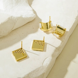 Elegant gold plated square geometric stud earrings and curved inlaid studs set on stone