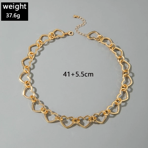 Detail of gold heart link necklace showing 37.6g weight and 41+5.5cm dimensions