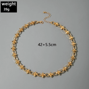 Detailed view of punk gold-plated studded necklace with lobster clasp and weight specs