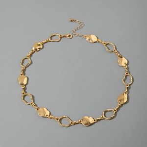 Punk style chunky gold metal chain necklace with textured irregular geometric discs
