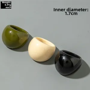 Detail of acrylic oval rings showing dimensions 1.7cm and weight 6.91g per piece