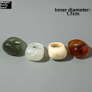 Close-up of chunky resin rings with dimensions 1.7cm inner diameter and 9.47g weight