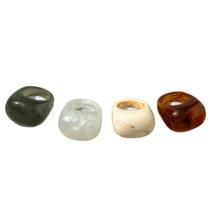 Minimalist acrylic resin rings in green, white, marble, and amber colors for women