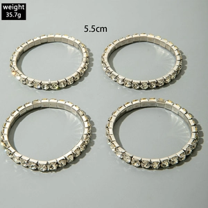 Details von vier silbernen elastischen Armbändern mit Strasssteinen, Gewicht 35,7g, Größe 5,5cm