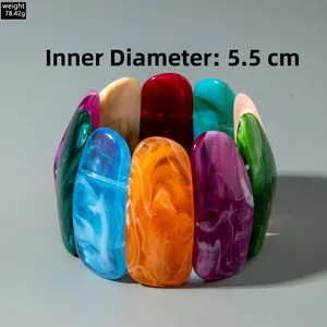 Detail of colorful marble-textured acrylic resin beads with 5.5cm inner diameter