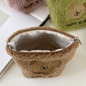 Plush brown bear makeup bag with Happy Bear embroidery and metal zipper closure
