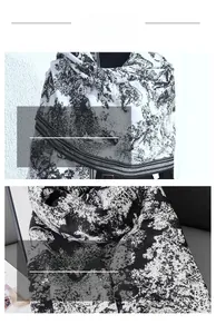 Détail de la texture de l'écharpe en maille avec imprimé abstrait noir et blanc