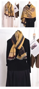 Detail of warm yellow scarf with sunflower oil painting print and fringed edges