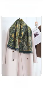 Detailed view of the woven cashmere-like scarf with oil painting texture and fringe hem